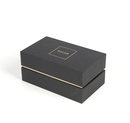 Bouteille cosmétique d'huile essentielle de boîte de PaperLuxury de parfum noir de carton